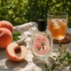 Peach Oolong |A sip of iced peach oolong on a