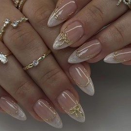 Jremg French Tip Press on Nails Medium Almond Fake Nail with Designs 3D Gold Bow Charms False Nails Glossy Gold Curve Lines Glue on Nails Reusable Artificial Stick on Nails for Women 24Pcs