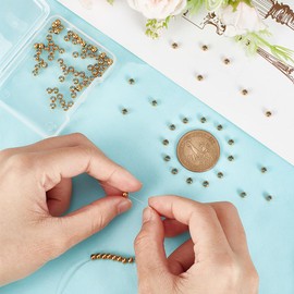 UNICRAFTALE Metal Spacer Beads, Stainless Steel Beads, Gold, Round Spacer Beads, 2 mm Hole Spacer Beads, Bracelets, Smooth Beads for Threading, for DIY Jewellery Chains, Making, 4 x 3 mm, Pack of 100