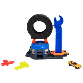 Hot Wheels City - Mega Centro Gomme, pista multidirezionale con carro attrezzi e veicolo incluso, l'officina ruota di 360 gradi e diventa una rampa, 3+ anni, JHL75