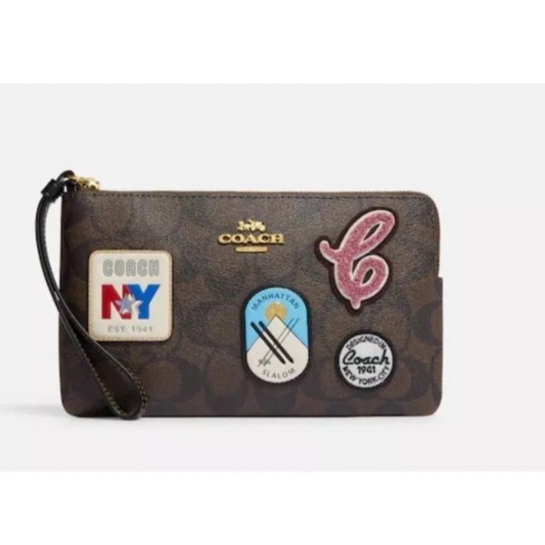 Coach Large Corner Zip Wristlet In Signature Canvas With Ski