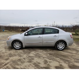 New Wheel Covers Replacements Fits 2010-2012 Nissan Sentra; 16 Inch; 10 Spoke; Silver; Plastic; Set of 4; Bolt On