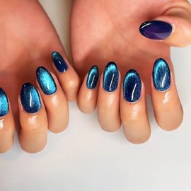 Sparkly Cat Eye Press on Nails, Cat Eye Manicure Art Acrylic Short Oval Fake Nails Stick on Nails with Starry Sky Design, Glossy Dark Blue Cat Eye False Nails Gel Glue on Nails for Women Girls 24Pcs