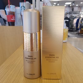 The Saem (The Saem) Snail Essential EX Wrinkle Solution Emulsion 150ml (New Core Dongsuwon Branch) / (더샘)스네일 에센셜 이엑스 링클 솔루션 에멀젼150ml(뉴코아 동수원점)