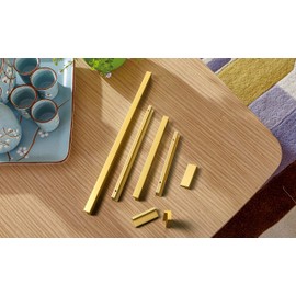 Goo-Ki Cabinet Handles 12 PCS - Light Brushed Brass Drawer Pulls 1-1/4 in (32mm) Hole Centers - Tilted Solid Drawer Handles for Kitchen Cabinet Pulls - Finger Pull 4402-TLS-32