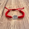 Pulsera de San Benito de Plata ley 925, roja tejida
