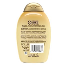 OGX, Acondicionador Fortalecedor Anti Caída, con Coco y Cafeína, Ingredientes Botánicos, 385 ml