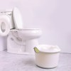 Ubbi Adjustable Toilet Trainer with Built-In Handles and Included Potty