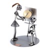 Steelman24 I Nuts and bolts sculpture Female Teacher With A