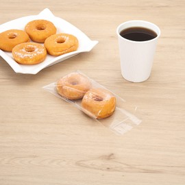 Restaurantware Bag Tek 6 x 4 Inch Treat Bags 100 Microwave-Safe Cookie Bags - Lip And Tape Design Heat-Resistant Clear Plastic Resealable Bakery Bags Grease-Resistant For Candy Nuts And Party Favors