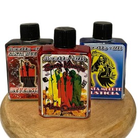 Santa Muerte/Holy Death Candle Oil 1/2oz - Color: Reversible/Reversible