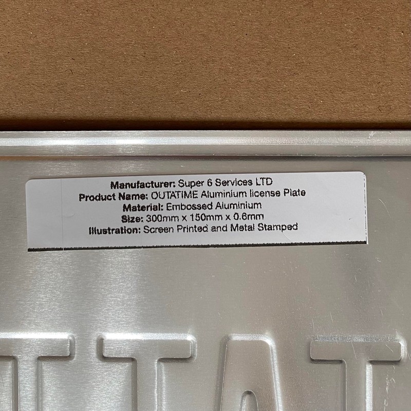 OUTATIME License Plate. Made from Aluminium. Text and License plate