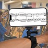 The music stand is compatible with mobile phones, specifically designed
