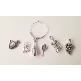 1 to 150 wine and vineyard themed wine charms for bridal shower favors rehearsal dinner favors and wedding favors for guests. 1 charm set. Fully customized.