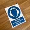 Ensure Safety Compliance with Hearing Protection Must Be Worn Sign