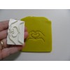 Hands into a heart stamp for many uses soap making