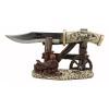 Western Horse Saddle By Wagon Wheel With Blunt Knife Display