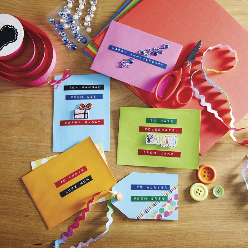 DYMO Embossing Label Maker with 3 DYMO Label Tapes Organizer