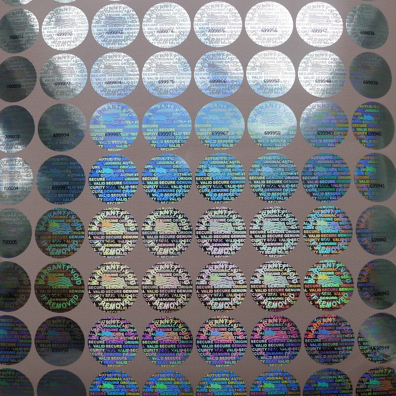 100 Round Bright Silver Hologram Sequentially Numbered Tamper Evident Security