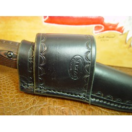 Custom cross draw knife sheath for the buck Selkirk knife. The sheath is made out of water buffalo hide leather Black.