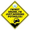 Novelty Car Window Sign, I'm Not Drunk Just Avoiding Potholes,
