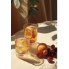Peach Oolong |A sip of iced peach oolong on a