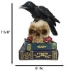 Raven Crow Perching On Skull With LED Eyes And Spell