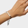 TOUS Black rope and beaded bracelet for women with solid