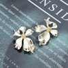 Vacaonio Boho Big Flower Stud Earrings Gold Floral Earrings Metal