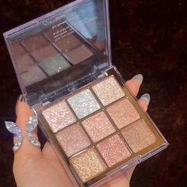 Shimmering Glitter Eyeshadow Palette for Women - 9 Colors of Highly Pigmented Eye Shadow with Gold, White, and Pink Hues. Perfect for Girls' Make-up Looks
