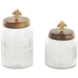 Deco 79 Glass Scroll Living Room Decorative Jars Decorative Container with Brown Wooden Lids and Gold Fleur-De- Lis Knobs, Set of 2 Jar with Lid 9", 7"H, Clear