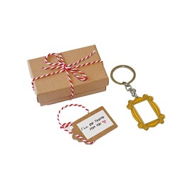 Yellow Frame in Monica's door. Keychain. Including a cute box with a ribbon and a small sign saying: I'll be there for you. Great present for your friends.