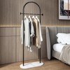 BUZUEY Freestanding Clothing Rack with Marble Base,Modern Black Arch Garment