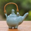 NOVICA Light Blue Ceramic Teapot with Rattan Handle, 27 Oz,