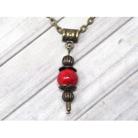 Necklace with vintage style pendant for woman in reconstituted red turquoise mounted on an antique bronze chain