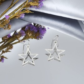 AeraVida Symmetric Shining Star Sterling Silver Celestial Dangle Earrings | Minimalist Everyday Wear | Handmade 0.87x1.38 Inch Star Earrings for Women