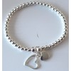 Silver Colour Round Beads With Heart Charms Stretchable Bracelet