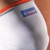 Kniebandage von Thuasne Sport - Weiß/Orange - Größe XL
