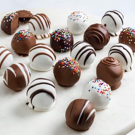 Brownie Points Brownie Bruffles: 18-Individually Wrapped Brownie Bruffles. Brownie Bruffle is a Brownie rolled in Ganache, cream cheese and wrapped in a rich chocolate shell. Gourmet gift for Her, Him, Friends or Family. Gift Boxed with a Bow. (BP_BRUFFLES18)