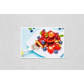 Poster Reproduction of Cottage cheese pancakes with fresh berries and strawberry sauce. Healthy and funny breakfast concept for kids. Ripe blueberry, fragrant mint leaves, cutlery. Gentle blue