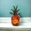 Homeroots 9" Orange Murano Glass Pineapple Statue Tabletop Sculpture