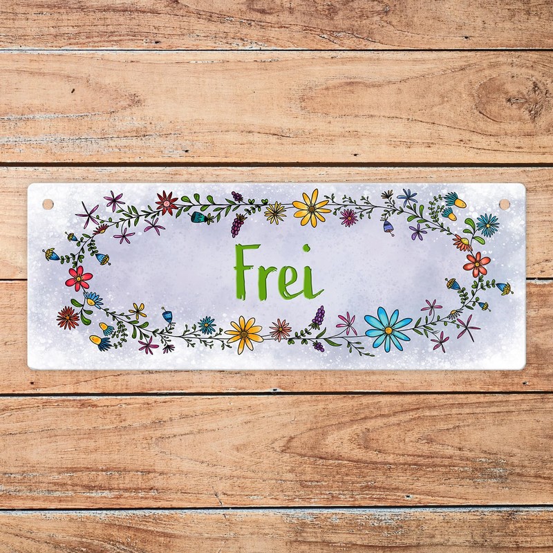 Grey toilet is free or occupied reversible sign with flower