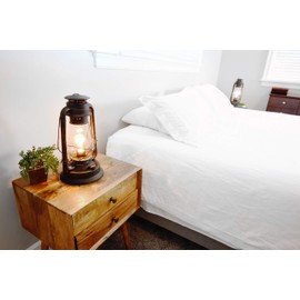 Electric Lantern Table Lamp for bedrooms to give You The Perfect Farmhouse Look Large 15 inches Tall with Large Hurricane Glass and in line Cord dimmer. Rustic Rust Patina Hand Finish.