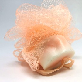 Cheer the bathroom Mango papaya Bathroom Puff that includes a large acrylic puff with hand strap and integrated oval 3 oz shea butter soap