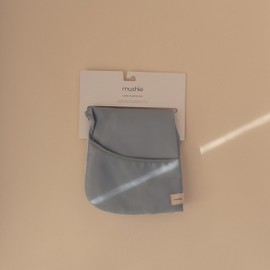 mushie Long Sleeve Baby Bib | Mess Free & Waterproof Fabric for Toddlers | Adjustable Fit for Ages 6-24 Months (Tradewinds)