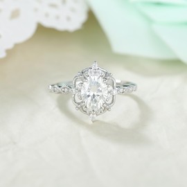 IRROYA Vintage 1.5 Carats Oval Cut Real Moissanite Ring Floral Setting Platinum Plated Silver Engagement Rings for Women Milgrain Infinity Round Moissanite Half Eternity Band Rings Unique Promise Wedding Gifts for Her Size 5.5