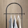 BUZUEY Freestanding Clothing Rack with Marble Base,Modern Black Arch Garment