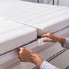 Mattress holder, connects two mattresses to a large lying surface,