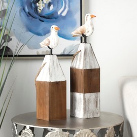 Deco 79 Wooden Bird Decorative Sculpture Home Decor Statues with White Distressed Buoy Posts, Set of 2 Accent Figurines 16", 15" H, Brown