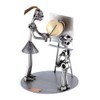 Steelman24 I Nuts and bolts sculpture Female Teacher With A